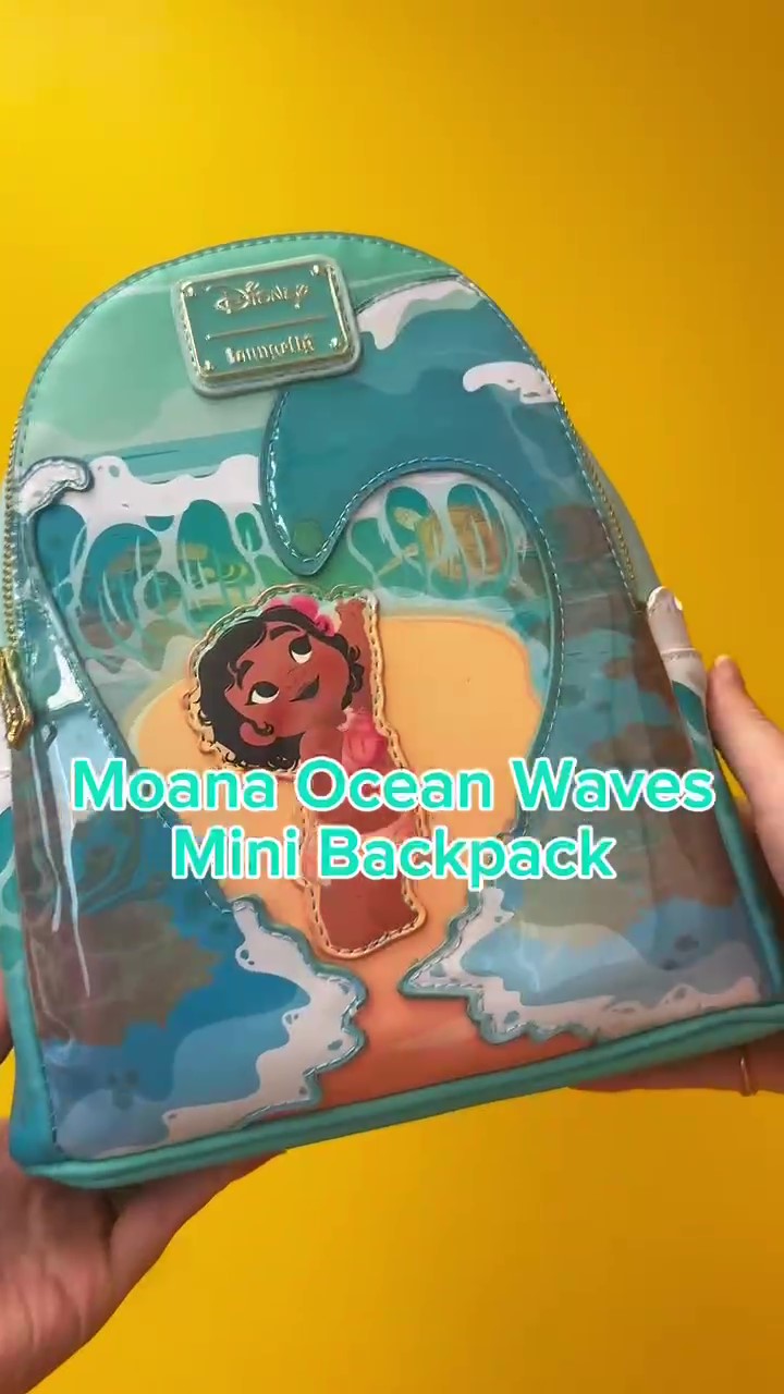 Ride the waves in style with the Disney Moana Ocean Waves Loungefly Mini Backpack! This beautifully designed accessory captures the adventurous spirit of Moana, featuring stunning ocean wave patterns and vibrant colors.